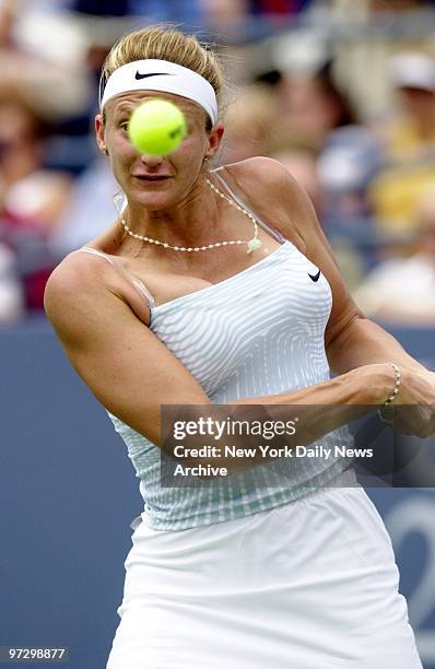 Mary Pierce keeps her eye on the ball as she hits a return in her third-round match against Magdalena Maleeva in the U.S. Open at Flushing Meadows....