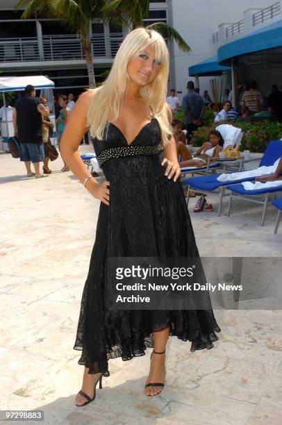 Singer Brooke Hogan strikes a pose by the pool at the Ritz-Carlton, South Beach hotel in Miami Beach, Fla., during a party hosted by Ocean Drive...