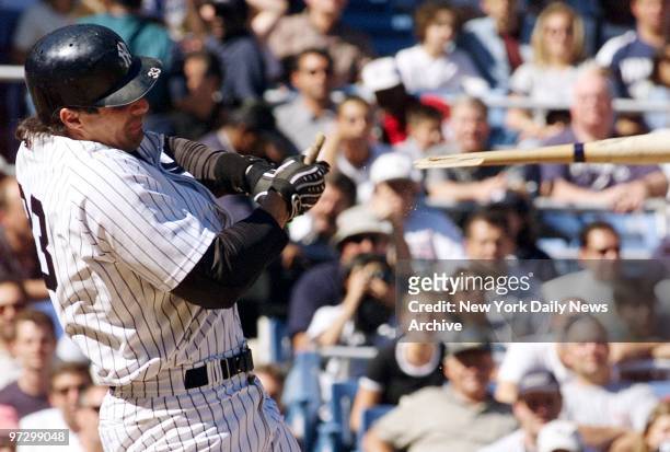 New York Yankees' Jose Canseco splits his bat while flying out against the Cleveland Indians at Yankee Stadium. The Yanks took a 15-4 battering from...