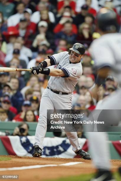 New York Yankees' Karim Garcia hits a single to bring in two runs in the second inning of Game 5 of the American League Championship Series against...
