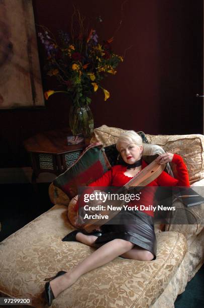 Singer Cyndi Lauper, who achieved instant stardom in 1984 with the debut of her album "She's So Unusual," cradles her dulcimer at her upper West Side...