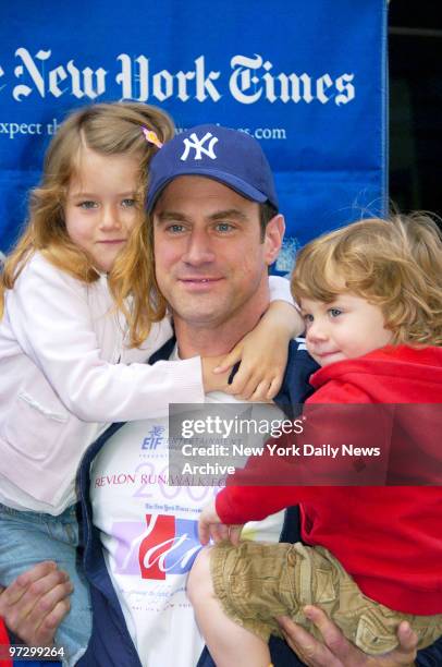 Celebrity host Christopher Meloni holds his daughter, Sophia, and son, Dante, at the Entertainment Industry Foundation's 9th Annual Revlon Run/Walk...