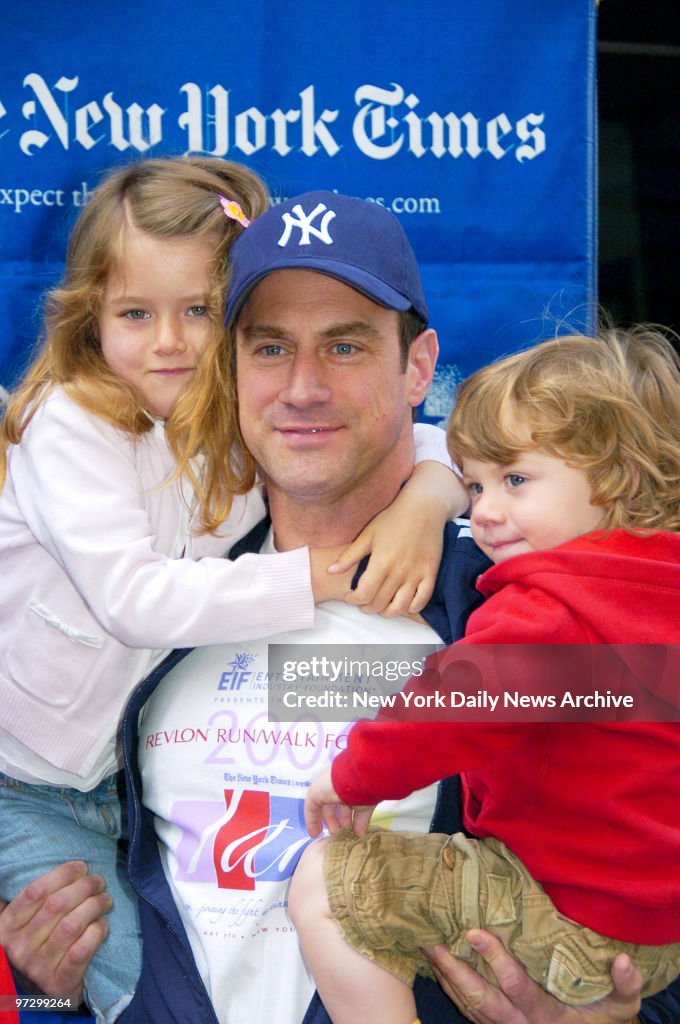 Celebrity host Christopher Meloni holds his daughter, Sophia, and ...