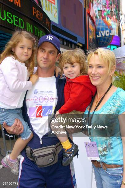 Celebrity host Christopher Meloni is joined by his wife, Sherman Williams, as he holds his daughter, Sophia, and son, Dante, at the Entertainment...