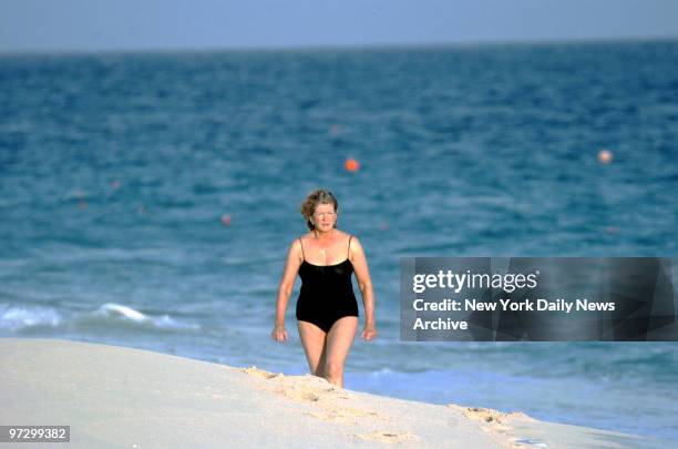 Martha Stewart walks on the beach after an early morning swim at the One and Only Ocean Club on Paradise Island in the Bahamas. Stewart is set to...