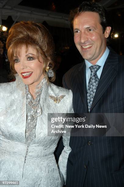 Joan Collins and husband Percy Gibson are on hand at Christie's for the Elizabeth Taylor AIDS Foundation Benefit Auction.