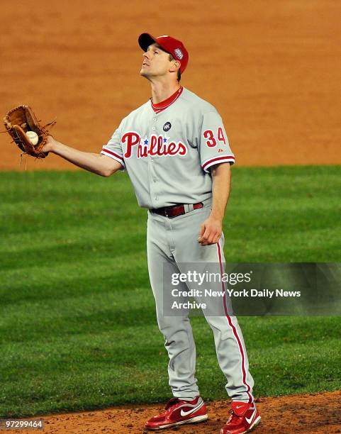 New York Yankees left fielder Johnny Damon pops out to Philadelphia Phillies starting pitcher Cliff Lee in the sixth inning at Yankee Stadium. He...