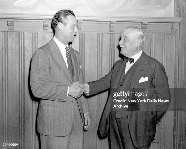 New York Yankees' Lou Gehrig and Col. Jacob Ruppert, even through they failed to agree on Lou's salary yesterday. Lou wants $41,400; he's offered...