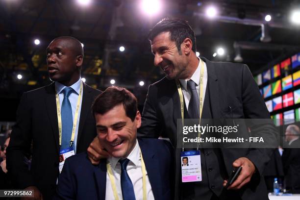 Former players Clarence Seedorf, Iker Casillas and Luis Figo attend the 68th FIFA Congress at the Moscow Expocentre on June 13, 2018 in Moscow,...
