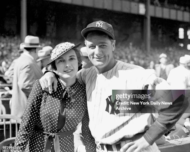 New York Yankees' Lou Gehrig with Mrs. Gehrig at Yankee Stadium before game against Washington.