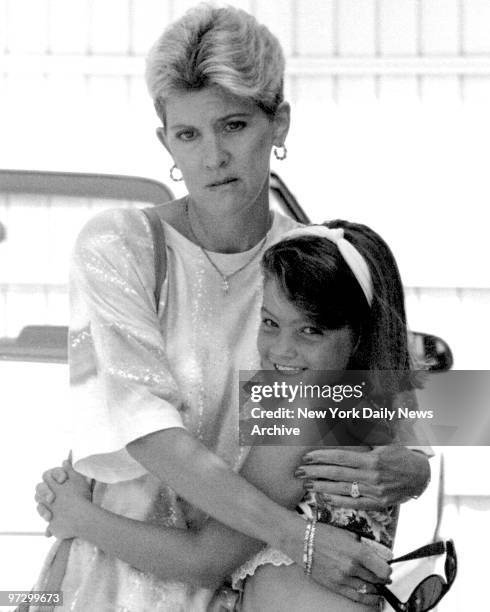 Mary Jo Buttafuoco and daughter, Jessica, outside their home.