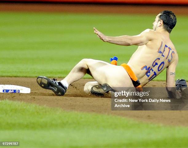 This isn't the kind of streak Mets fans had in mind as dope halts action at Citi Field . Streaker.