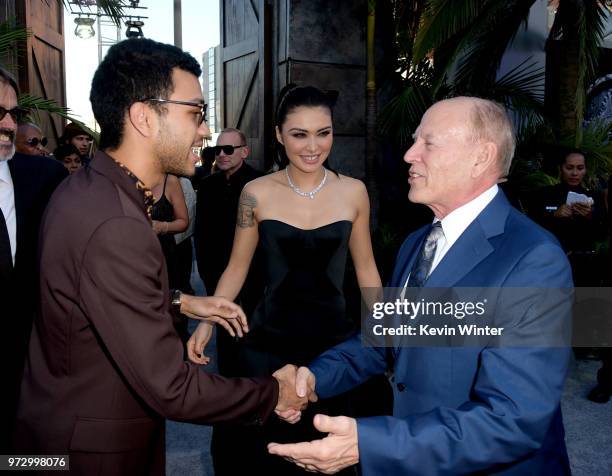 Actors Justice Smith, Daniella Pineda and producer Frank Marshall arrive at the premiere of Universal Pictures and Amblin Entertainment's "Jurassic...