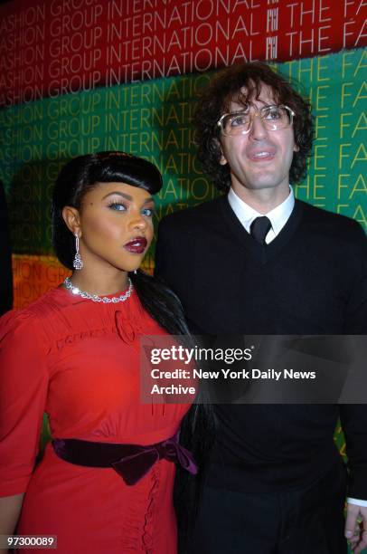 Singer Lil' Kim and designer Marc Jacobs get together during the Fashion Group International's 21st annual Night of Stars awards gala at Cipriani...