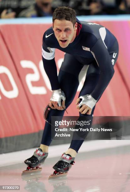 Chad Hedrick of the U.S. Catches his breath after competing in the Men's 10,000-meter Speed Skating competition at the Oval Lingotto during the 2006...