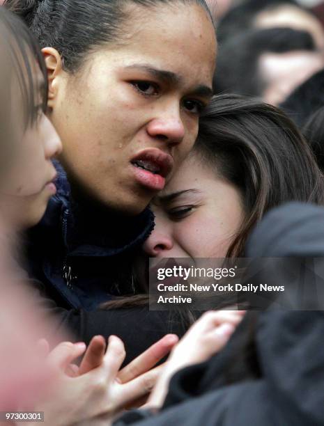 Friends and teammates grieve during a funeral procession for 10-year-old Douglas Jiang, Shuk Tse and Kevin Kwan outside Central Funeral Home in...