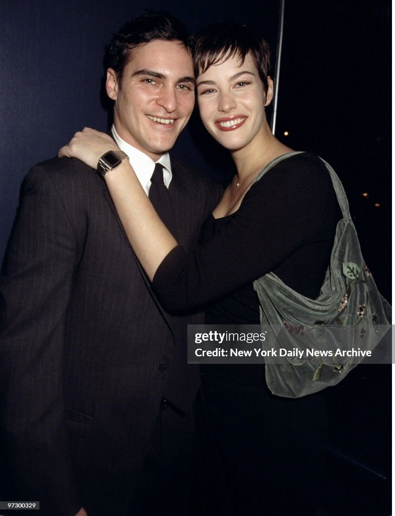 Joaquin Phoenix and Liv Tyler make a cozy couple at the prem