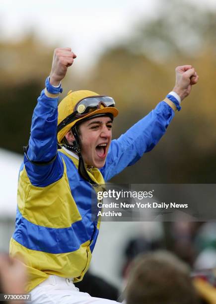 Jockey Christophe Soumillon, aboard Shirocco, exults after winning the $2 760 Breeders' Cup Turf race by 1 3/4 lengths during the 22nd Breeders' Cup...