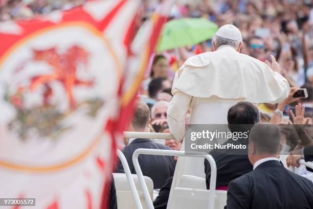 Pope Francis arrives to lead his Wednesday General audience in Saint Peter's Square at the Vatican, 13 Jun 2018