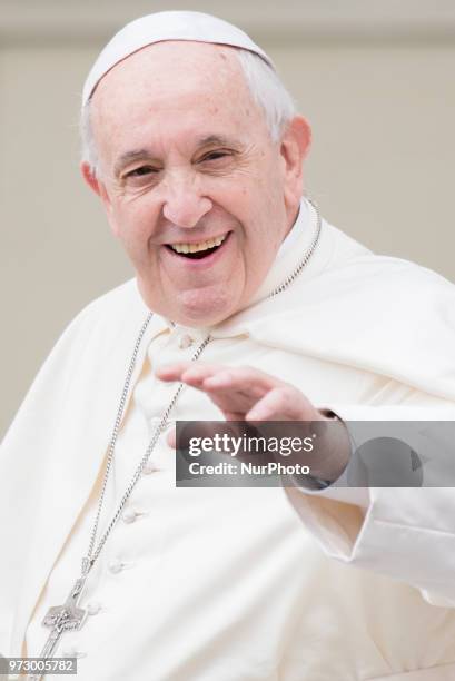 Pope Francis arrives to lead his Wednesday General audience in Saint Peter's Square at the Vatican, 13 Jun 2018