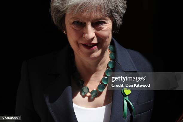 British Prime Minister Theresa May leaves Downing Street on June 13, 2018 in London, England. The Prime Minister will attend today the weekly Prime...