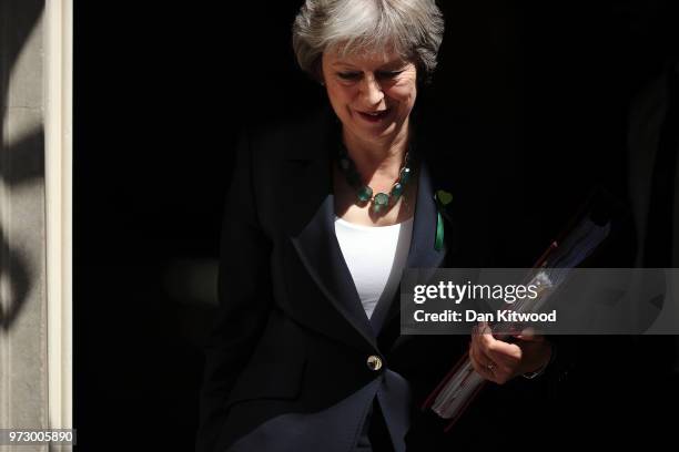 British Prime Minister Theresa May leaves Downing Street on June 13, 2018 in London, England. The Prime Minister will attend today the weekly Prime...