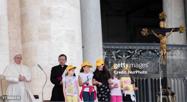 Pope Francis arrives to lead his Wednesday General audience in Saint Peter's Square at the Vatican, 13 Jun 2018.