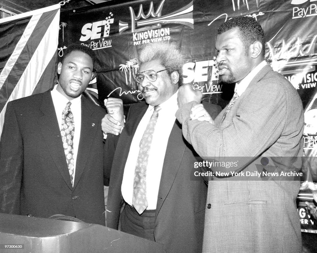 Champ Lennox Lewis, Promoter Don King and challenger, Tony "