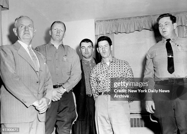 From left, Detective Michael J. Cullenhane, state trooper Paul Keating, Patrolman Daniel Guertin and state trooper Daniel Sullivan stand with their...