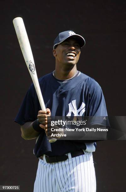 New York Yankees' minor league prospect Austin Jackson smiles as he holds a bat during spring training camp at Legends Field in Tampa, Fla.