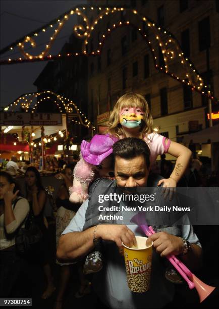 Thomas Fiore, and daughter Tatiana of Freeport, NY, at the Feast of San Gennaro in Manhattan