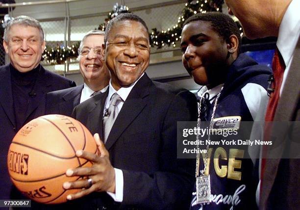 From Left: Jerry Colangelo, Chairman of the NBA Board of Governors and owner of the Phoenix Suns; David Stern, NBA Commissioner; Robert Johnson,...