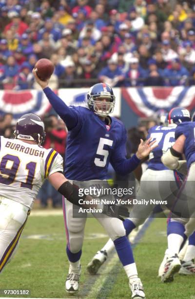 New York Giants' Kerry Collins throws pass en route to 41-0 victory over the Minnesota Vikings in the NFC Championship game. ,