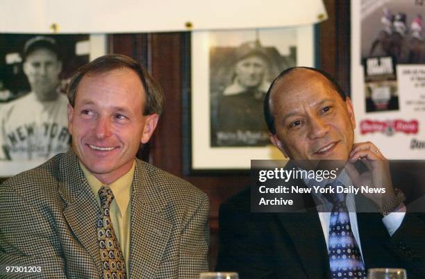 Jockeys Steve Cauthen and Jorge Velasquez share a table at Gallagher's Steak House for a luncheon marking the 25th anniversary of the Triple Crown...