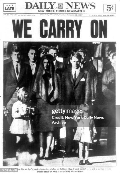 Front page of the Daily News dated Nov. 26 Headline: WE CARRY ON, John F. Kennedy Jr. Salutes his father's casket as he stands with his mother...