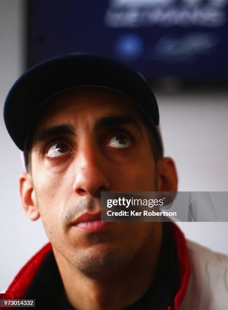 The Toyota Gazoo Racing TS050 Hybrid driver Sebastien Buemi is interviewed by the media prior to practice for the Le Mans 24 Hour race at the Circuit...