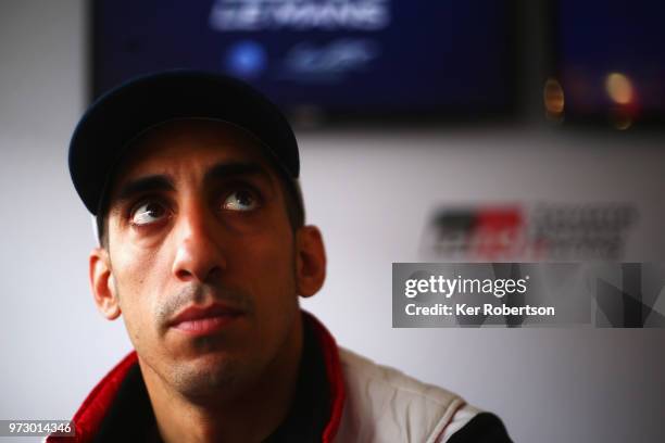 The Toyota Gazoo Racing TS050 Hybrid driver Sebastien Buemi is interviewed by the media prior to practice for the Le Mans 24 Hour race at the Circuit...