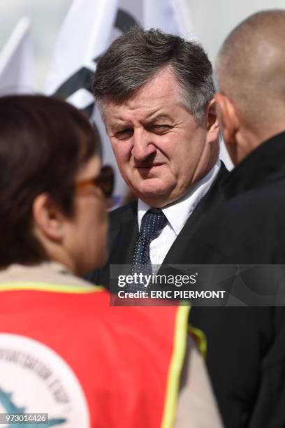 Augustin de Romanet head of ADP group listens to demonstrators prior to the arrival of French Economy Minister Bruno Le Maire at the ADP headquarters...