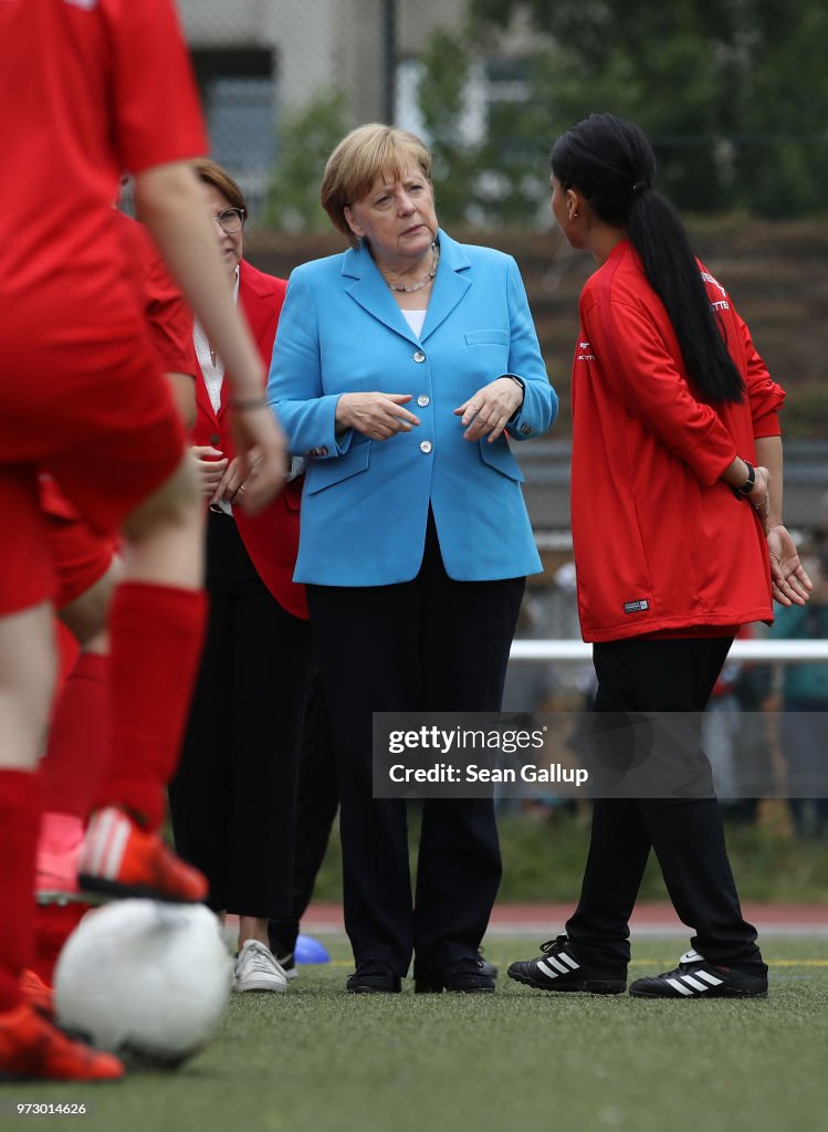 Merkel Visits Integration Project For Young Women Through Football