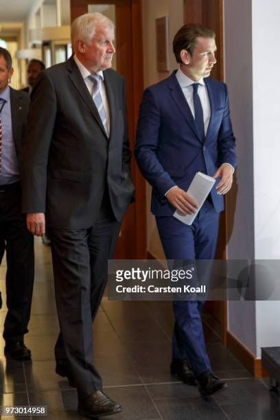 Austrian Chancellor Sebastian Kurz and German Interior Minister Horst Seehofer arrive to speak to the media on June 13, 2018 in Berlin, Germany. Both...