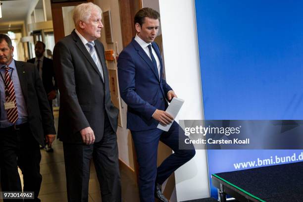 Austrian Chancellor Sebastian Kurz and German Interior Minister Horst Seehofer arrive to speak to the media on June 13, 2018 in Berlin, Germany. Both...