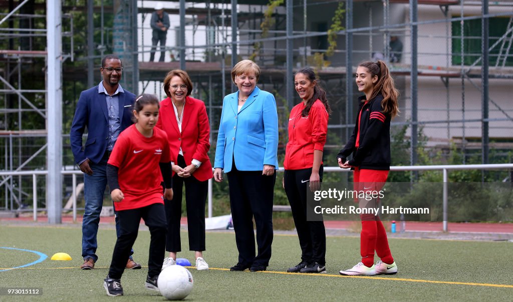 Merkel Visits Integration Project For Young Women Through Football