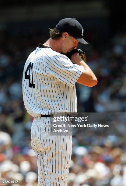 New York Yankees' starter Randy Johnson reacts after giving up two runs to the New York Mets during the first inning of game at Yankee Stadium....