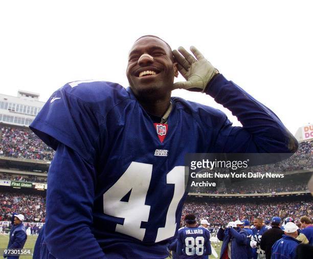 New York Giants' Dave Thomas enjoys the roar of the crowd after his team crushed the Minnesota Vikings, 41-0, in the NFC Championship Game at Giants...