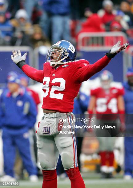 New York Giants' defensive end Michael Strahan celebrates after getting a sack in the third quarter against the Dallas Cowboys at Giants Stadium. The...