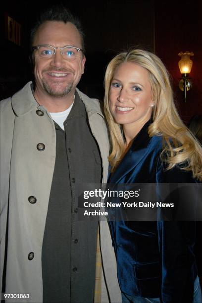 Tom Arnold and wife Shelby arrive at the Ziegfeld Theater for the premiere of the movie "Cradle 2 the Grave."