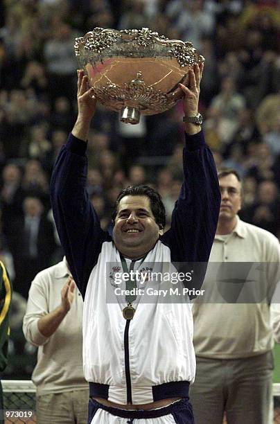 Spanish captain Javier Duarte holds aloft the Davis Cup after the fourth rubber between Juan Carlos Ferrero of Spain and Lleyton Hewitt of Australia...