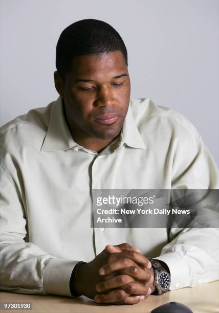 New York Giants' defensive end Michael Strahan speaks about his divorce battle at his publicist's Chelsea office. His wife, Jean Strahan, called...