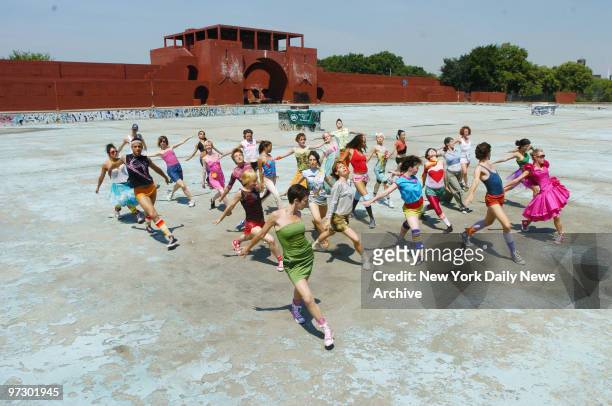Noemie LaFrance's dance group performs excerpts from her work entitled "Agora" inside McCarren Pool in Greenpoint, Brooklyn. Officials announced the...