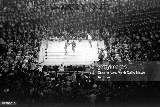 Joe Frazier takes on Muhammad Ali during heavyweight bout at Madison Square Garden.